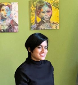 Image of Nimisha Doongarwal, a female artist sitting in her studio